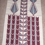 Embroidered wall hanging - £